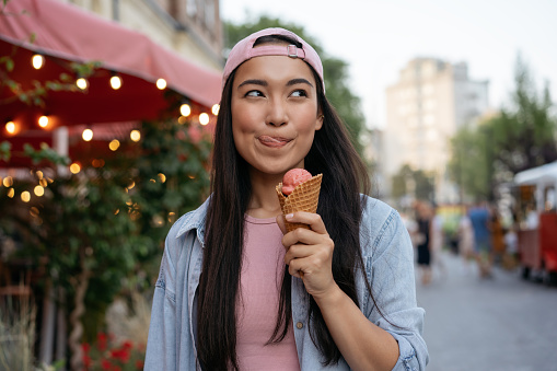 girl holding ice cream cone